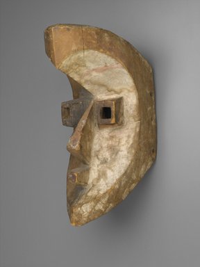 Possibly Kota (Mahongwe subgroup). <em>Mask</em>, late 19th century. Wood, pigment, 14 x 6 x 9 in. (35.6 x 15.2 x 22.9 cm). Brooklyn Museum, Frank L. Babbott Fund, 52.160. Creative Commons-BY (Photo: Brooklyn Museum, 52.160_PS2.jpg)