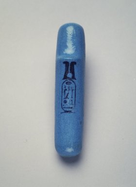  <em>Model of a Hieroglyph Inscribed for Ramesses II</em>, ca. 1279-1213 B.C.E. Faience, 5/8 x 3 7/16 in. (1.6 x 8.7 cm). Brooklyn Museum, Charles Edwin Wilbour Fund, 52.54. Creative Commons-BY (Photo: Brooklyn Museum, 52.54_transpc001.jpg)