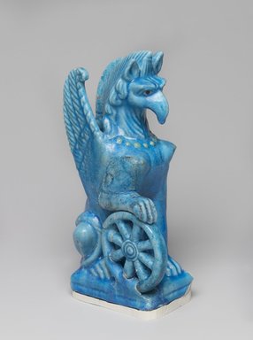  <em>Statuette of Nemesis in Form of Female Griffin with Wings</em>, 2nd century C.E. Faience, glazed, 9 3/16 x 2 13/16 x 4 3/16 in. (23.4 x 7.2 x 10.7 cm). Brooklyn Museum, Charles Edwin Wilbour Fund, 53.173. Creative Commons-BY (Photo: , 53.173_PS9.jpg)