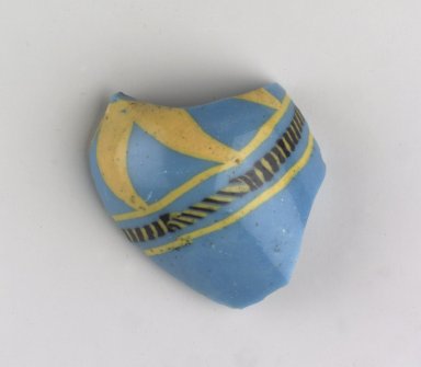 Egyptian. <em>Fragment of a Small Vase</em>, ca. 1479-1425 B.C.E. Glass, 1 7/8 x 1 1/2 x 1/4 in. (4.8 x 3.8 x 0.7 cm). Brooklyn Museum, Anonymous gift, 53.176.4. Creative Commons-BY (Photo: Brooklyn Museum, 53.176.4_view2.jpg)