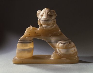  <em>Lion Holding Vessel</em>, 525-404 B.C.E. Egyptian alabaster (calcite), 4 x 4 3/4 x 2 in. (10.2 x 12.1 x 5.1 cm). Brooklyn Museum, Charles Edwin Wilbour Fund, 53.223. Creative Commons-BY (Photo: Brooklyn Museum, 53.223_SL3.jpg)