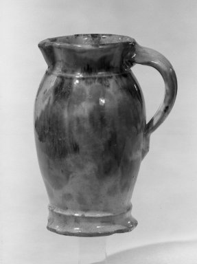 John Bell. <em>Pitcher</em>, ca. 1850. Earthenware, 6 7/8 x 1 1/4 in. (17.5 x 3.3 cm). Brooklyn Museum, Gift of Mrs. Charles Messer Stow, 53.257.3. Creative Commons-BY (Photo: Brooklyn Museum, 53.257.3_acetate_bw.jpg)
