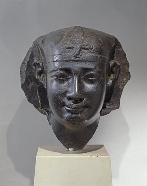  <em>Head of a Ptolemaic King</em>, 3rd century B.C.E. (probably). Basalt, 16 x 16 1/2 x 16 in. (40.6 x 41.9 x 40.6 cm). Brooklyn Museum, Charles Edwin Wilbour Fund, 53.75. Creative Commons-BY (Photo: Brooklyn Museum, 53.75_front_SL1.jpg)