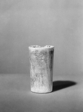  <em>Cylinder Inscribed with a King's Name</em>, ca. 2800–2780 B.C.E. Bone, 2 1/4 x Diam. 1 5/16 in. (5.7 x 3.3 cm). Brooklyn Museum, Charles Edwin Wilbour Fund, 53.79. Creative Commons-BY (Photo: Brooklyn Museum, 53.79_view1_bw_SL1.jpg)