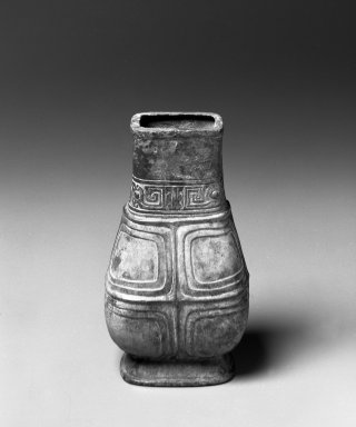  <em>Ritual Jar (Hu)</em>, 1027–221 B.C.E. Bronze, 7 11/16 x 3 1/8 x 4 1/4 in. (19.6 x 8 x 10.8 cm). Brooklyn Museum, Gift of David James in memory of his brother, William James, 54.10.13. Creative Commons-BY (Photo: Brooklyn Museum, 54.10.13_bw.jpg)