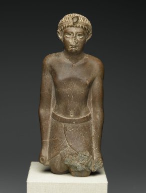  <em>Ptolemaic Prince</em>, 51-30 B.C.E. Quartzite, 12 1/2 x 5 5/16 x 3 3/8 in. (31.8 x 13.5 x 8.5 cm). Brooklyn Museum, Charles Edwin Wilbour Fund, 54.117. Creative Commons-BY (Photo: Brooklyn Museum, 54.117_front_PS2.jpg)