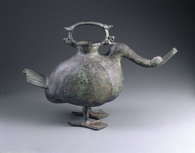  <em>Wine Vessel (Zun) in the Form of a Goose</em>, 206 B.C.E.-220 C.E. Bronze, 11 1/2 x 6 3/16 x 17 1/2 in. (29.2 x 15.7 x 44.5 cm). Brooklyn Museum, Gift of Mr. and Mrs. Alastair B. Martin, the Guennol Collection, 54.145a-b. Creative Commons-BY (Photo: Brooklyn Museum, 54.145a-b_SL1.jpg)