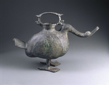  <em>Wine Vessel (Zun) in the Form of a Goose</em>, 206 B.C.E.–220 C.E. Bronze, 11 1/2 x 6 3/16 x 17 1/2 in. (29.2 x 15.7 x 44.5 cm). Brooklyn Museum, Gift of Mr. and Mrs. Alastair B. Martin, the Guennol Collection, 54.145a-b. Creative Commons-BY (Photo: Brooklyn Museum, 54.145a-b_SL1.jpg)