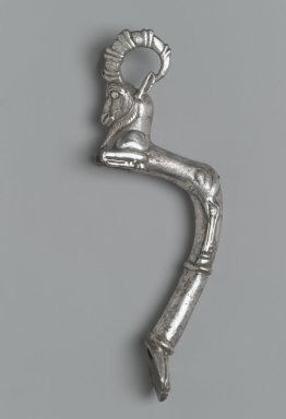 Achaemenid. <em>Vessel Handle in Form of Ibex</em>, ca. 410 B.C.E. Silver, Height 6 9/16in. (16.7cm). Brooklyn Museum, Charles Edwin Wilbour Fund, 54.50.41. Creative Commons-BY (Photo: Brooklyn Museum, 54.50.41_left_PS2.jpg)