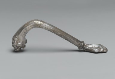 Achaemenid. <em>Vessel Handle in Form of Lion</em>, ca. 410 B.C.E. Silver, Length: 4 15/16 in. (12.5 cm). Brooklyn Museum, Charles Edwin Wilbour Fund, 54.50.42. Creative Commons-BY (Photo: Brooklyn Museum, 54.50.42_side_PS2.jpg)