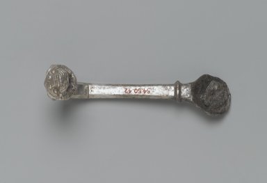 Achaemenid. <em>Vessel Handle in Form of Lion</em>, ca. 410 B.C.E. Silver, Length: 4 15/16 in. (12.5 cm). Brooklyn Museum, Charles Edwin Wilbour Fund, 54.50.42. Creative Commons-BY (Photo: Brooklyn Museum, 54.50.42_top_PS2.jpg)