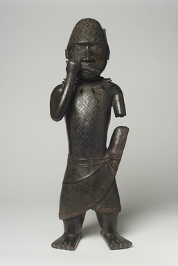 Edo. <em>Figure of a Hornblower (Ikpakohẹn)</em>, ca. 1504–50. Copper alloy, iron, 24 1/2 x 8 1/2 x 6 in. (62.2 x 21.6 x 15.2 cm). Brooklyn Museum, Gift of Mr. and Mrs. Alastair B. Martin, the Guennol Collection, 55.87. Creative Commons-BY (Photo: Brooklyn Museum, 55.87_overall_PS11.jpg)