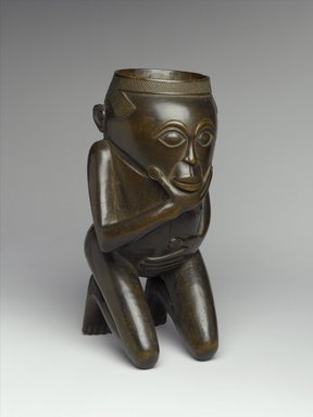 Kuba (Bushoong subgroup). <em>Palm Wine Cup (Mbwoongntey)</em>, 19th century. Wood, 8 1/2 x 4 1/2 x 5 1/4 in. (21.6 x 11.4 x 13.3 cm). Brooklyn Museum, Gift of Arturo and Paul Peralta-Ramos, 56.6.37. Creative Commons-BY (Photo: Brooklyn Museum, 56.6.37_threequarter_PS2.jpg)