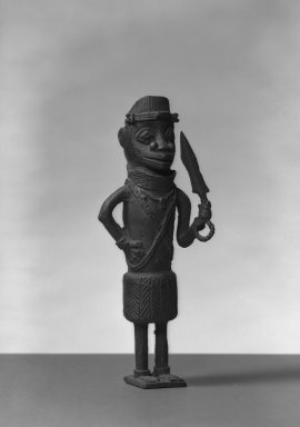 Edo. <em>Standing Male Figure</em>, 19th century. Copper alloy, 8 3/4 × 3 1/8 in. (22.2 × 8 cm). Brooklyn Museum, Gift of Arturo and Paul Peralta-Ramos, 56.6.67. Creative Commons-BY (Photo: Brooklyn Museum, 56.6.67_acetate_bw.jpg)