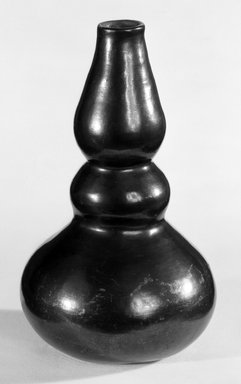 Nyoro. <em>Vase</em>, ca. 1920. Ceramic, l: 9 in. (22.9 cm) x diam: 5 1/5 in. (14.0 cm). Brooklyn Museum, Gift of Mr. and Mrs. Sidney W. Davidson, 57.162. Creative Commons-BY (Photo: Brooklyn Museum, 57.162_bw.jpg)