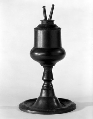 American. <em>Oil Lamp</em>, 1843-1846. Pewter, 8 1/2 x 5 1/8 x 5 1/8 in. (21.6 x 13 x 13 cm). Brooklyn Museum, Gift of the Estate of Mrs. Lathrop C. Harper, 57.167. Creative Commons-BY (Photo: Brooklyn Museum, 57.167_bw.jpg)