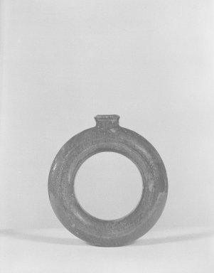 American. <em>Flask</em>, 18th century. Glazed earthenware, 6 1/2 in. (16.5 cm) Diameter. Brooklyn Museum, Gift of Huldah Cail Lorimer in memory of George Burford Lorimer, 57.75.10. Creative Commons-BY (Photo: Brooklyn Museum, 57.75.10_acetate_bw.jpg)