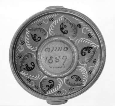 Solomon Bell (American, 1817–1882). <em>Mixing Bowl</em>, 1859. Earthenwre, Height: 4 3/4 in. (12 cm). Brooklyn Museum, Gift of Huldah Cail Lorimer in memory of George Burford Lorimer, 57.75.41. Creative Commons-BY (Photo: Brooklyn Museum, 57.75.41_bottom_bw.jpg)