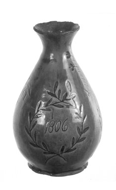  <em>Vase</em>, 1806. Earthenware, 8 3/4 x 3 5/8 in. (22.2 x 9.2 cm). Brooklyn Museum, Gift of Huldah Cail Lorimer in memory of George Burford Lorimer, 57.75.9. Creative Commons-BY (Photo: Brooklyn Museum, 57.75.9_bw.jpg)