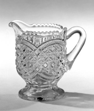  <em>Creamer</em>, ca. 1880. Pressed glass, 3 1/4 x 2 1/2 in. (8.3 x 6.4 cm). Brooklyn Museum, Gift of Mrs. Cheever Porter, 57.90.90. Creative Commons-BY (Photo: Brooklyn Museum, 57.90.90_bw.jpg)