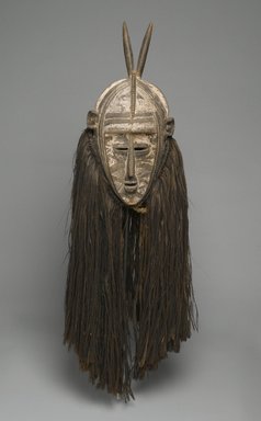 Bobo. <em>Bolo Mask</em>, early 20th cenutry. Wood, pigment, fiber, 45 1/2 x 14 x 13 in. (115.6 x 35.6 x 33 cm). Brooklyn Museum, Gift of Mr. and Mrs. Gustave Schindler, 58.184. Creative Commons-BY (Photo: Brooklyn Museum, 58.184_PS1.jpg)