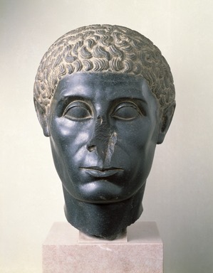  <em>Head of an Egyptian Official</em>, ca. 50 B.C.E. Diorite, 16 5/16 x 11 1/4 x 13 7/8 in. (41.4 x 28.5 x 35.2 cm). Brooklyn Museum, Charles Edwin Wilbour Fund, 58.30. Creative Commons-BY (Photo: Brooklyn Museum, 58.30_SL1.jpg)