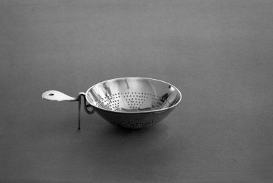American. <em>Tea Strainer</em>, ca. 1768. Silver Brooklyn Museum, Gift of Mrs. Leo R. Healy in memory of Leo R. Healy, by exchange, 59.135. Creative Commons-BY (Photo: Brooklyn Museum, 59.135_acetate_bw.jpg)