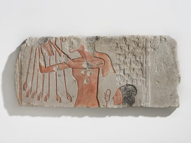  <em>Akhenaten and His Daughter Offering to the Aten</em>, ca. 1353–1336 B.C.E. Limestone, pigment, 8 15/16 × 20 5/16 × 1 1/4 in., 14.5 lb. (22.7 × 51.6 × 3.2 cm, 6.58kg). Brooklyn Museum, Charles Edwin Wilbour Fund
, 60.197.6. Creative Commons-BY (Photo: , 60.197.6_PS9.jpg)