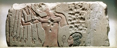 <em>Akhenaten and His Daughter Offering to the Aten</em>, ca. 1352–1336 B.C.E. Limestone, pigment, 8 15/16 × 20 5/16 × 1 1/4 in., 14.5 lb. (22.7 × 51.6 × 3.2 cm, 6.58kg). Brooklyn Museum, Charles Edwin Wilbour Fund
, 60.197.6. Creative Commons-BY (Photo: Brooklyn Museum, 60.197.6_view2_colorcorrected_SL1.jpg)