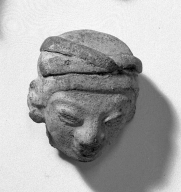  <em>Figure of Head, Turbaned and Wears Nose Ornament</em>. Clay Brooklyn Museum, Bequest of Porter Hoagland, 60.50.2. Creative Commons-BY (Photo: Brooklyn Museum, 60.50.2_acetate_bw.jpg)