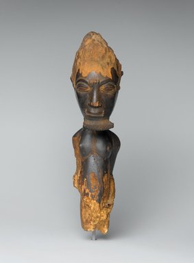 Baule. <em>Male Figure (Waka Sran)</em>, early 20th century. Wood, 11 x 3 9/16 x 4 1/4 in. (27.9 x 9 x 10.8 cm). Brooklyn Museum, Frank L. Babbott Fund, 61.3. Creative Commons-BY (Photo: Brooklyn Museum, 61.3_front_PS2.jpg)