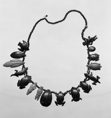 Tukano. <em>Charm Necklace</em>, mid-20th century. Palm nut, seeds, plant fiber, 6 1/4 × 3/4 × 8 1/4 in. (15.9 × 1.9 × 21 cm). Brooklyn Museum, Gift of E.R. Squibb and Sons, 61.89. Creative Commons-BY (Photo: Brooklyn Museum, 61.89_acetate_bw.jpg)