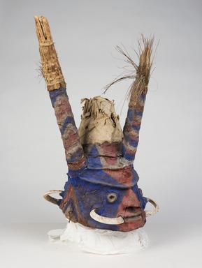 Tomman Islander. <em>Headdress</em>, early 20th century. Bamboo, leaves, vegetal-fiber paste, tusks, pigment, 20 3/4 x 19 1/2 x 21 in. (52.7 x 49.5 x 53.3 cm). Brooklyn Museum, Frank L. Babbott Fund, 62.18.4. Creative Commons-BY (Photo: , 62.18.4_threequarter_PS11.jpg)