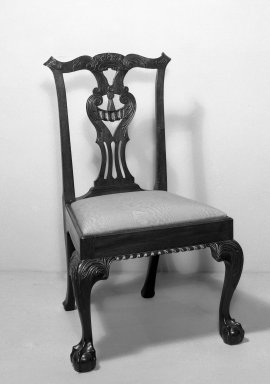American. <em>Side Chair, One of Set</em>, ca. 1760-1770. Carved mahogany, Chippendale style, 13 1/2 x 24 x 21 1/2 in. (34.3 x 61 x 54.6 cm). Brooklyn Museum, Dick S. Ramsay Fund, 62.3.4. Creative Commons-BY (Photo: Brooklyn Museum, 62.3.4_threequarter_acetate_bw.jpg)
