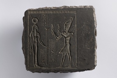  <em>King with Sistra (Rattles) before Hathor</em>, 3rd century B.C.E. Basalt, 7 3/4 × 8 11/16 × 3 1/8 in. (19.7 × 22 × 8 cm). Brooklyn Museum, Charles Edwin Wilbour Fund, 62.46. Creative Commons-BY (Photo: Brooklyn Museum, 62.46_PS22.jpg)