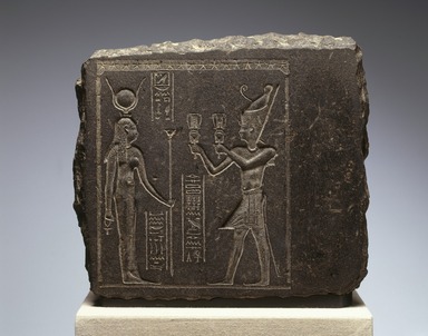  <em>King with Sistra (Rattles) before Hathor</em>, 3rd century B.C.E. Basalt, 7 3/4 x 8 11/16 x 3 1/8 in. (19.7 x 22 x 8 cm). Brooklyn Museum, Charles Edwin Wilbour Fund, 62.46. Creative Commons-BY (Photo: Brooklyn Museum, 62.46_SL1.jpg)