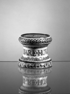  <em>Pounce Pot</em>, ca. 1726. Earthenware, glazed, 3 3/16 x 3 1/4 in. (8.1 x 8.3 cm). Brooklyn Museum, Gift of H. Randolph Lever in memory of Mary E. Lever, 62.78.5. Creative Commons-BY (Photo: Brooklyn Museum, 62.78.5_acetate_bw.jpg)