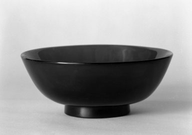 <em>Footed bowl</em>, 19th-20th century. Cobalt blue glass, 4 1/8 x 9 3/8 in. (10.5 x 23.8 cm). Brooklyn Museum, Gift of Dr. and Mrs. Frank L. Babbott, Jr., 62.79.11. Creative Commons-BY (Photo: Brooklyn Museum, 62.79.11_bw.jpg)