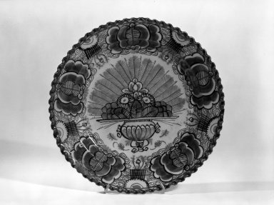  <em>Plate - One of Set of Six</em>. Earthenware, tin glaze Brooklyn Museum, Purchased with funds given by anonymous donors, 63.99.6. Creative Commons-BY (Photo: Brooklyn Museum, 63.99.6_acetate_bw.jpg)