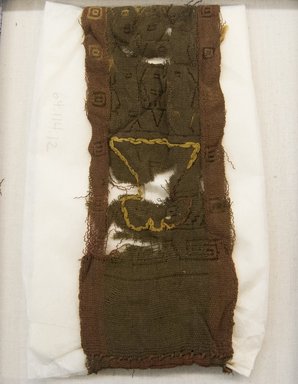 Coastal or Moche Wari. <em>Headband or Narrow Band Made into Headband, Fragment</em>, 600-1000 C.E. Cotton, camelid fiber, 3 9/16 x 20 1/2 in. (9 x 52 cm). Brooklyn Museum, Gift of Adelaide Goan, 64.114.12 (Photo: Brooklyn Museum, 64.114.12_front_PS5.jpg)