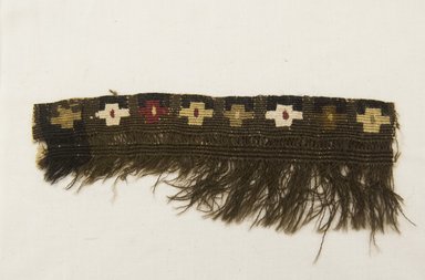  <em>Fragment of Tapestry with Design of Crosses in a Row</em>. Wool, Cotton, 3 3/8 x 7 1/2 in. (8.6 x 19.1 cm). Brooklyn Museum, Gift of Adelaide Goan, 64.114.285 (Photo: Brooklyn Museum, 64.114.285_front_PS5.jpg)