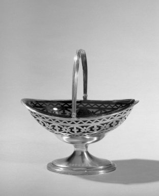 Hester Bateman (English, active in London, 1774-1789). <em>Sweet Meat Basket</em>, ca. 1788-1789. Silver, glass, 3 1/2 in. (8.9 cm). Brooklyn Museum, Gift of Mr. and Mrs. Frederick B. Hicks, 64.152.13a-b. Creative Commons-BY (Photo: Brooklyn Museum, 64.152.13_acetate_bw.jpg)