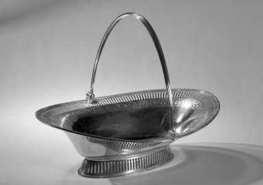 Hester Bateman (English, active in London, 1774-1789). <em>Cake Basket</em>, ca. 1784. Silver, 12 1/4 x 10 1/4 x 14 3/8 in. (31.1 x 26 x 36.5 cm). Brooklyn Museum, Gift of Mr. and Mrs. Frederick B. Hicks, 64.152.1. Creative Commons-BY (Photo: Brooklyn Museum, 64.152.1_acetate_bw.jpg)