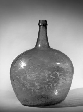 American. <em>Bottle</em>, ca. 1820. Glass, 19 in. (48.3 cm). Brooklyn Museum, Gift of Andrew Catapano, 64.202. Creative Commons-BY (Photo: Brooklyn Museum, 64.202_acetate_bw.jpg)
