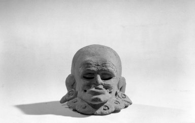 South Central Veracruz. <em>Head</em>. Ceramic, 3 x 2 1/2 x 2 3/8 in. (7.6 x 6.4 x 6 cm). Brooklyn Museum, Carll H. de Silver Fund, 64.213.2. Creative Commons-BY (Photo: Brooklyn Museum, 64.213.2_front_acetate_bw.jpg)