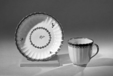  <em>Coffee Cups and Saucers, One of Set                             Blue/gold trim</em>, ca. 1795-1796. Porcelain, Other (cup): 2 1/2 x 2 5/8 in. (6.4 x 6.7 cm). Brooklyn Museum, Anonymous gift, 64.241.51. Creative Commons-BY (Photo: Brooklyn Museum, 64.241.51_acetate_bw.jpg)