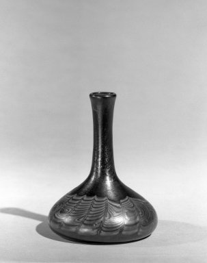 Louis Comfort Tiffany (American, 1848-1933). <em>Vase</em>, ca. 1900. Irridescent glass, 3 3/4 x 2 3/4 x 2 3/4 in. (9.5 x 7 x 7 cm). Brooklyn Museum, Gift of Mrs. Anthony Tamburro in memory of her father, Rene de Quelin, 64.246.4. Creative Commons-BY (Photo: Brooklyn Museum, 64.246.4_acetate_bw.jpg)