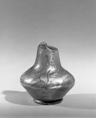 Louis Comfort Tiffany (American, 1848-1933). <em>Vase</em>, ca. 1900. Irridescent glass, 3 1/2 x 1 5/8 in. (8.9 x 4.1 cm). Brooklyn Museum, Gift of Mrs. Anthony Tamburro in memory of her father, Rene de Quelin, 64.246.5. Creative Commons-BY (Photo: Brooklyn Museum, 64.246.5_acetate_bw.jpg)
