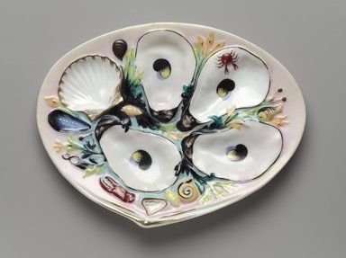 Thomas C. Smith (American, 1815–1901). <em>Oyster Plate</em>, patented January 4, 1881. Porcelain, 3/4 x 8 5/8 x 6 5/8 in. (1.9 x 21.9 x 16.8 cm). Brooklyn Museum, H. Randolph Lever Fund, 66.182. Creative Commons-BY (Photo: Brooklyn Museum, 66.182_PS9.jpg)