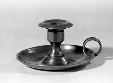 Ostrander & Norris. <em>Chamberstick</em>, 1848–1850. Pewter, 2 3/4 x 5 1/2 x 5 1/8 in. (7 x 14 x 13 cm). Brooklyn Museum, H. Randolph Lever Fund, 66.186.2. Creative Commons-BY (Photo: Brooklyn Museum, 66.186.2_acetate_bw.jpg)